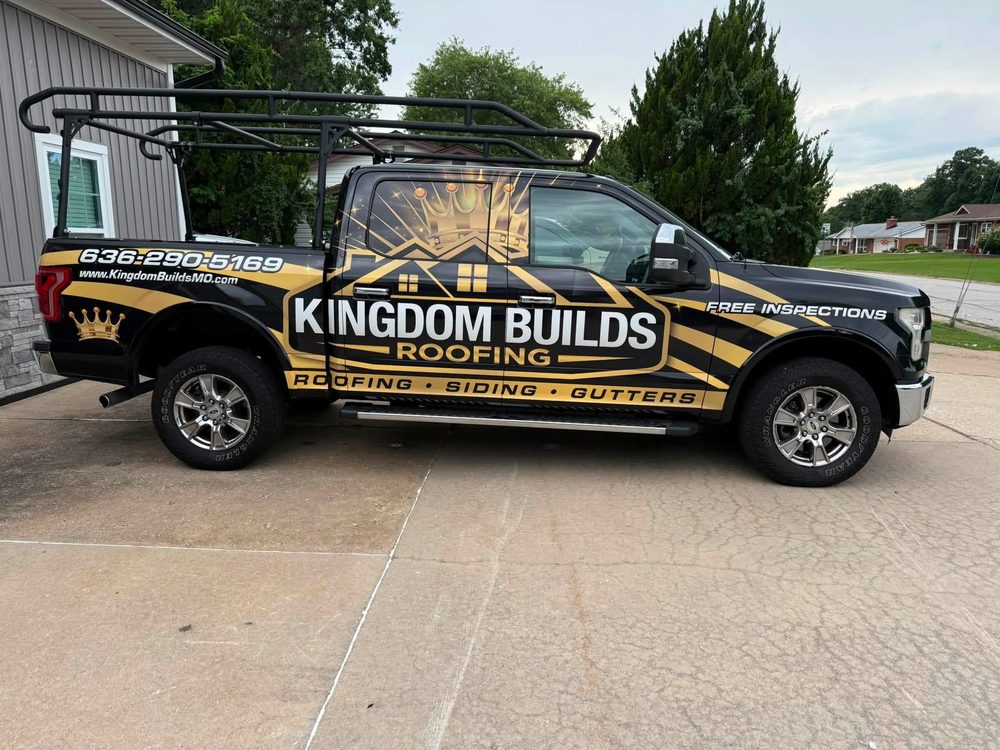 Black and gold full wrap on a Ford F-150 with ladder rack for Kingdom Builds Roofing